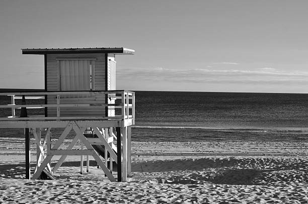 A lifeguard hut on a white sand Florida beach.